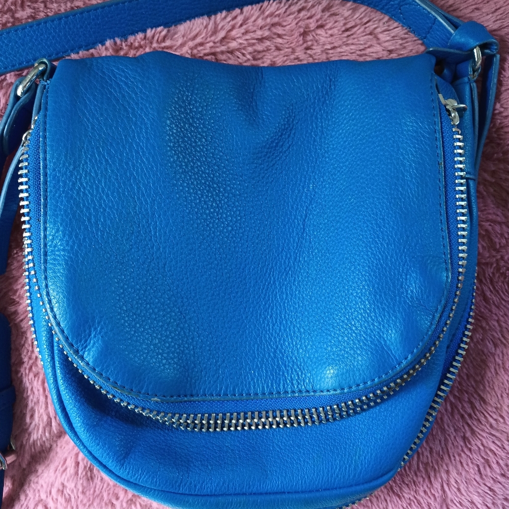 Vince Camuto Baily crossbody bag, color is Ultra Violet .